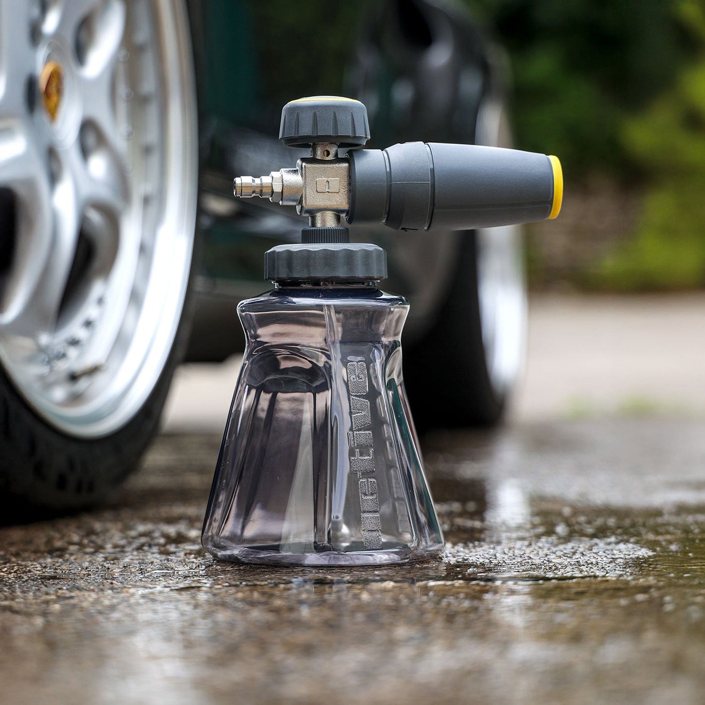 Active™ Premium Foam Cannon for car washing with a car tire in the background