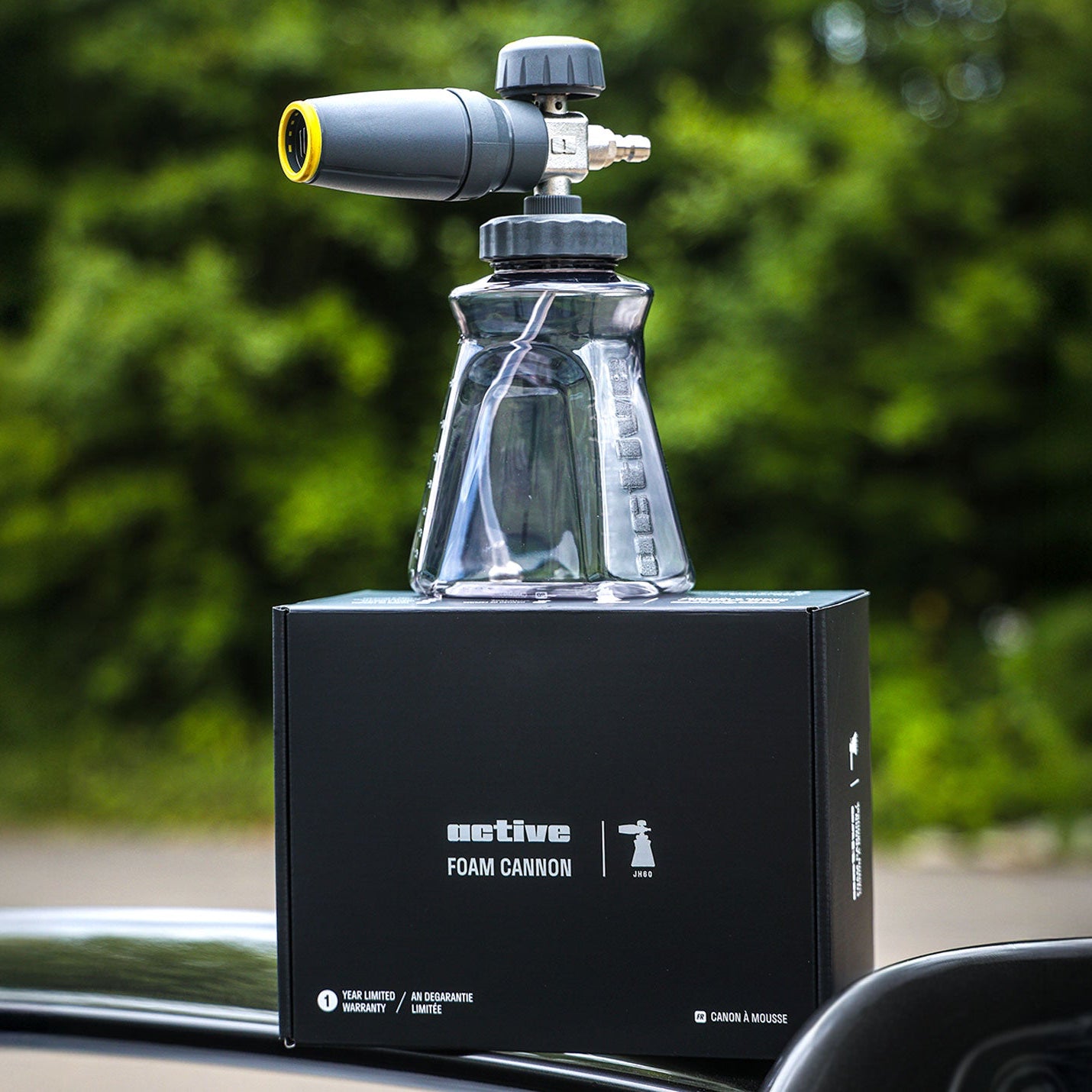 Active™ Premium Foam Cannon on a black box with a blurred green background