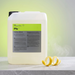 Koch-Chemie PreFoam Efficient alkaline pre-wash cleaner in a large plastic container with fresh lemon peel garnish.