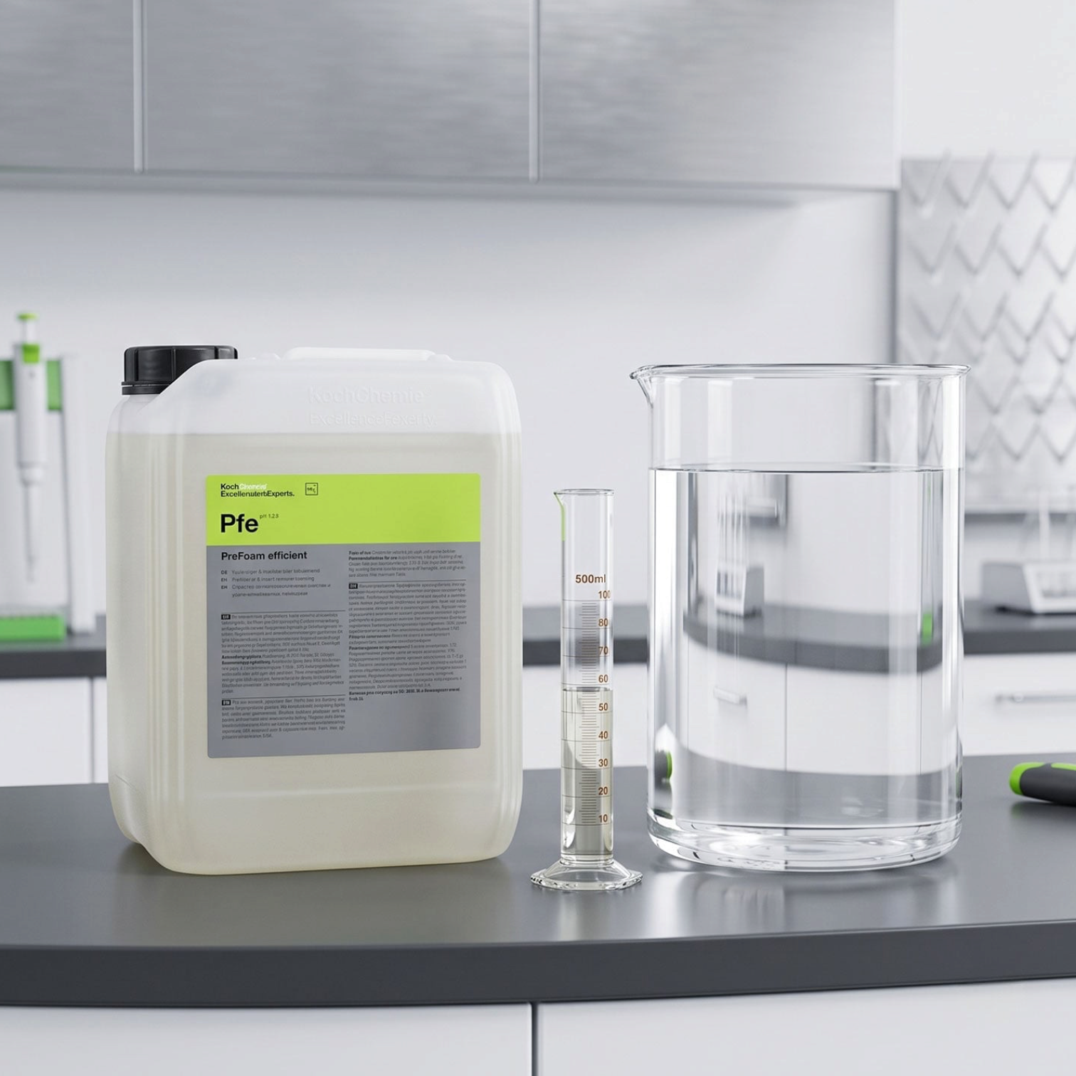 Koch-Chemie PreFoam Efficient alkaline pre-wash cleaner in a large container with measuring cylinders on a workbench.