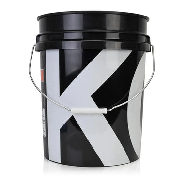 Black and white bucket with a large letter 'K' on a white background
